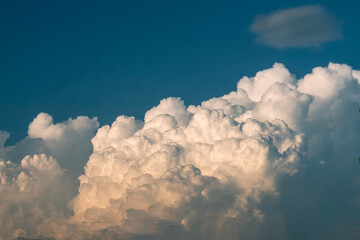 Tropical summer blue sky fluffy white cloud summertime on light sunny day cloudscape. Clear bright blue skyline spring sunlight climate background. Heaven blue environment ecology high scenic nature.