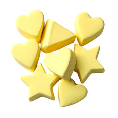 Yellow bath bombs shaped like hearts stars and triangles