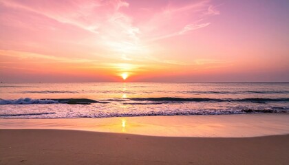 Sunrise Over the Ocean with Golden Light Reflecting on Water and Beach with Pink and Orange Sky at Dusk