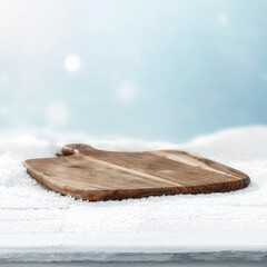 Winter landscape with fresh white snow and copy space for product placement or text. Blurred  snow-covered trees and cloudy winter sky background.