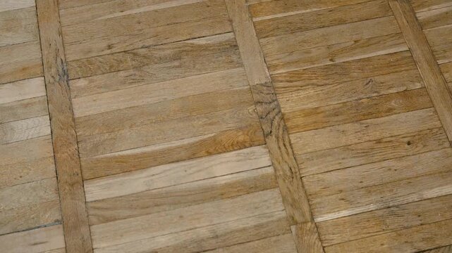 Rustic wooden floorboards with visible grain texture and vertical beams pattern