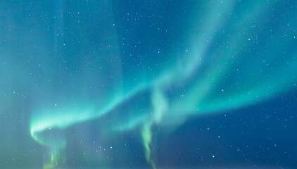 Northern lights or Aurora borealis in the sky - Tromso, Norway