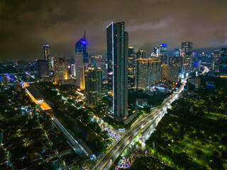 Obraz premium Indonesia, Malaysia: skyscrapers, sunset, train, vibrant photos