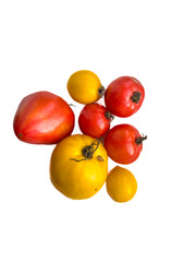Variety of ripe yellow and red tomatoes