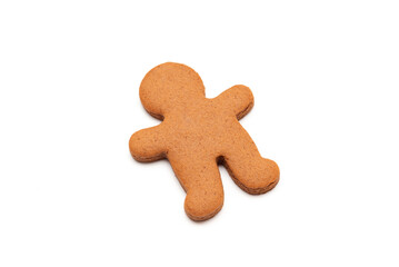Single plain gingerbread man cookie isolated on a white background, perfect for holiday and winter baking concepts