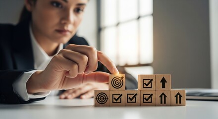 Hyperrealistic close-up of a woman's hand organizing wooden blocks symbolizing business strategy, targets, and progress on a desk, with soft natural light emphasizing determination and planning