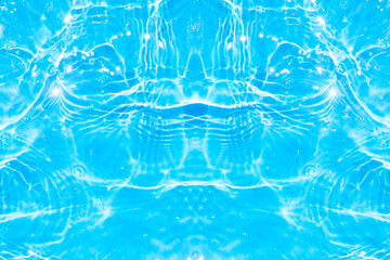 Blue water with ripples on the surface. Defocus blurred transparent blue colored clear calm water surface texture with splashes and bubbles. Water waves with shining pattern texture background.