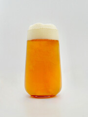 An Australian style lager isolated against a white background.