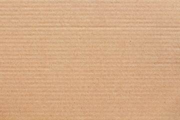 Cardboard sheet texture background, detail of recycle brown paper box pattern.