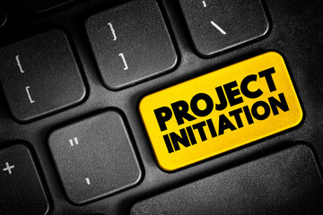 Fototapeta premium Project initiation - first step in starting a new project, text button on keyboard, concept background