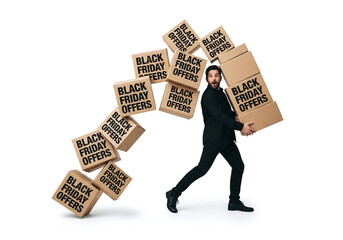 Overwhelmed man struggles with a cascade of Black Friday offer boxes, capturing the chaotic excitement of holiday shopping deals.