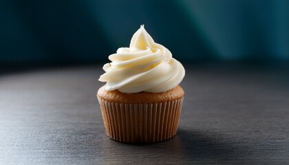 delicious vanilla cupcake topped with creamy white frosting