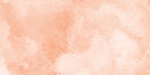 Fototapeta premium abstract Soft peach and orange watercolor wash background texture, vibrant orange watercolor wash texture background, geometric rumpled triangular low poly style graphic background. 