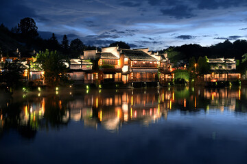The ancient Hui-style building in front of the pond and its reflection