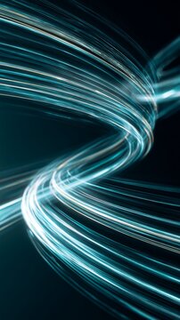 Dynamic abstract light trails create a mesmerizing pattern of energy and motion against a dark background, showcasing the beauty of movement and futuristic design elements.