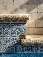 Stone pool steps with decorative blue patterned ceramic tiles and water reflection