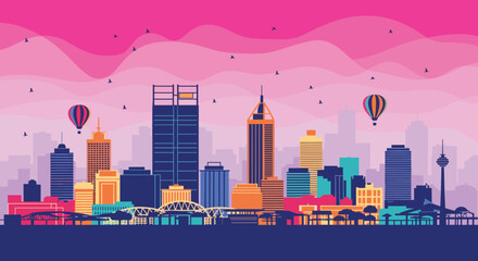 Naklejka premium A vibrant cityscape with colorful buildings and hot air balloons floating in the sky.