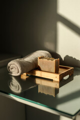 Serene Spa Retreat with Natural Soap and Soft, Cozy Towel Bathed in Gentle Morning Light