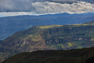 Naklejka premium Mirador of Huanca Urco near Chachapoyas, the view stretches across dramatic canyons and a vast Andean landscape. A sweeping panorama where depth, silence, and grandeur merge, offering a glimpse into t