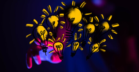 Fototapeta premium Hand interacting with glowing lightbulbs,concepts of innovation, inspiration, and problem-solving.
