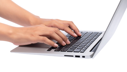 Hand on a laptop keyboard, using the internet for work and communication Isolated On White Background