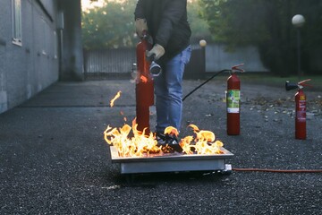 corporate safety - exercise during a firefighting course