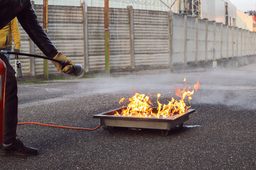 corporate safety - exercise during a firefighting course