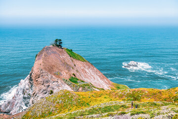 Scenic view of Mori Point near Pacifica, California, along Highway 1 with steep cliffs, Pacific Ocean waves, and coastal hiking trails, capturing iconic Bay Area landscape and travel destination © Volodymyr