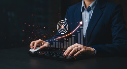 Business Growth Strategy: Person using computer with digital financial charts, target and arrow