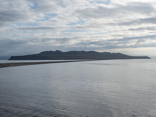 island, shore and rocks on the seashore in iceland
