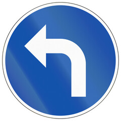 Historic road sign in Finland - Turn left ahead (1982-2020)