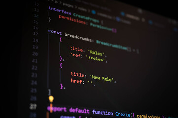 Close-up of TypeScript code displaying breadcrumb items structure with page titles and routes, representing frontend development, UI navigation, and clean code practices for modern web applications.