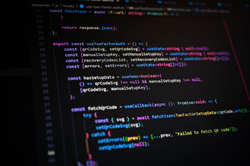Close-up of colorful JavaScript code on dark screen showing two-factor authentication logic, used in web development, programming, secure login systems, and modern cybersecurity practices.
