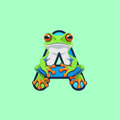 Obraz premium A green tree frog sitting on a capital letter A.