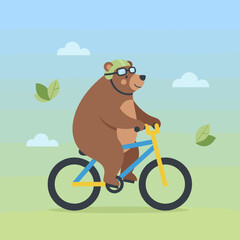 Bear riding a bicycle with helmet and goggles in a playful setting  