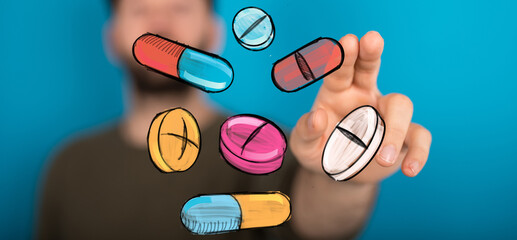 Hand interacting with illustrated pills. Healthcare, medicine, pharmacy concept.  Bright, colorful image.