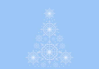 Christmas tree made from cut out white paper snowflakes on a blue background. template