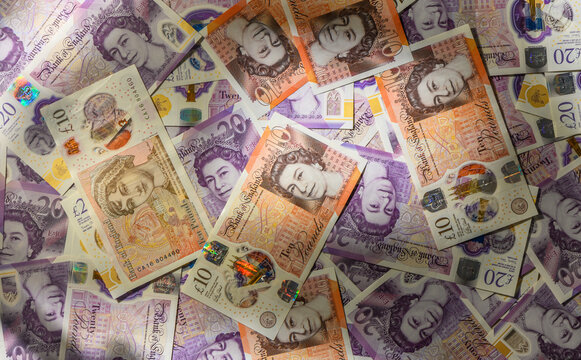Pound Sterling Notes on Table