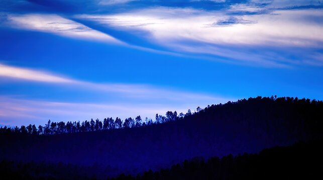 quiet. A majestic mountain silhouette against a twilight sky, radiating calm and natural beauty. travel magazines, destination branding, designed for outdoor magazines and nature guides. - Powered by Adobe