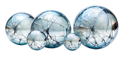 Collection of cracked glass spheres with sharp fractures isolated on a transparent background