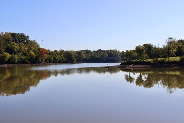 The lake in the park on a sunny day.
