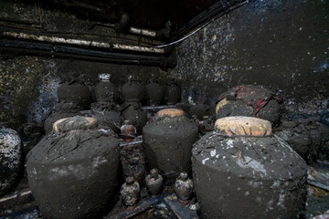 Aged sorghum wine stored in the basement cellar