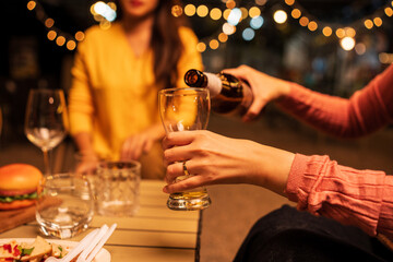 young couple celebrating with champagne