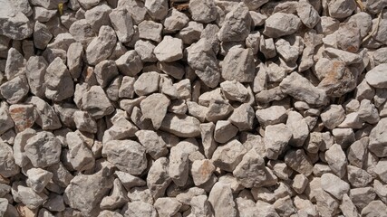 Gravel grey pebbles seamless texture background pattern close up mock up