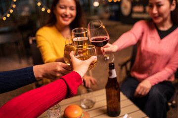 young couple drinking wine in bar