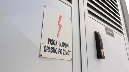 Electricity high voltage sign symbol. Risk, hazard, caution, warning concept close up