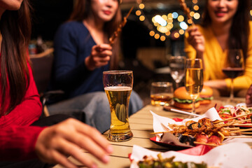 Celebrate whisky at an intimate party at a camping restaurant. A group celebration.	