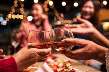 Celebrate whisky at an intimate party at a camping restaurant. A group celebration.	