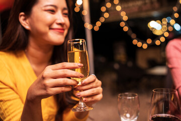 young woman with a glass of champagne