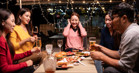 group of young people in restaurant